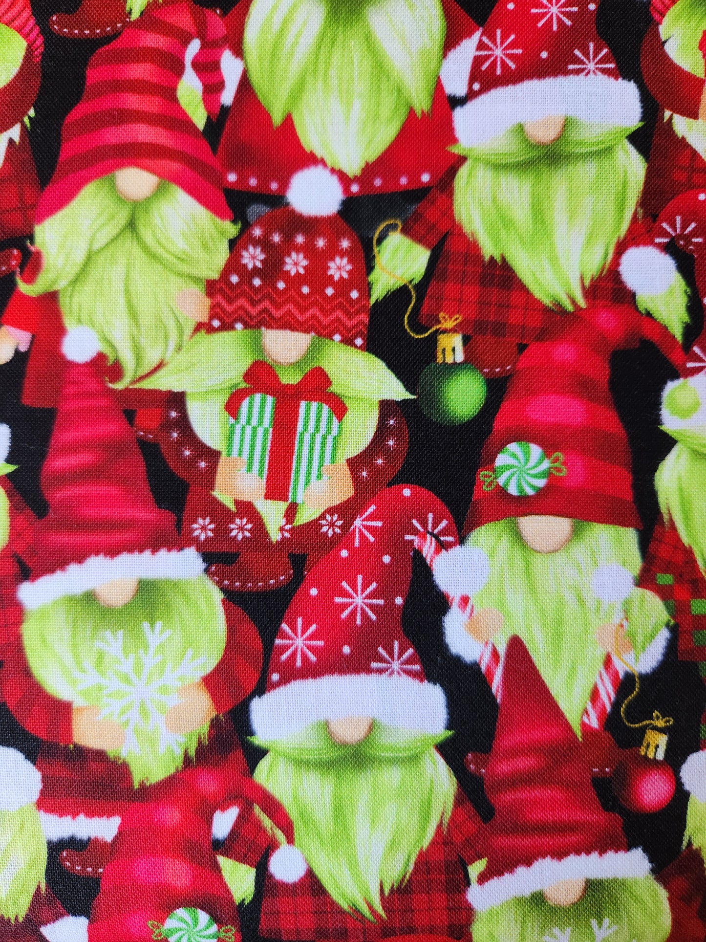 Christmas fabric - black background gnomes with green beards wearing red Toque celebrating the holidays