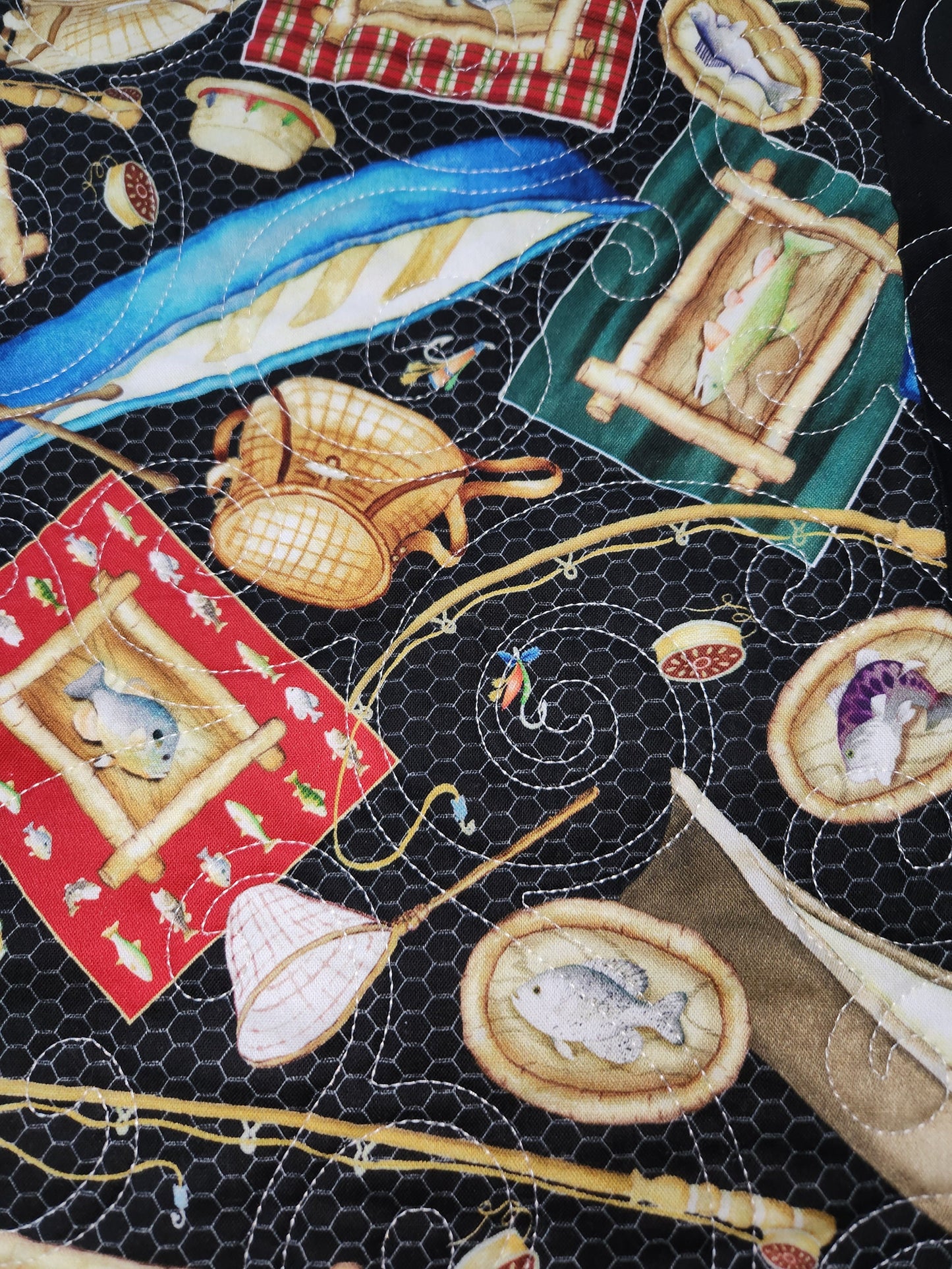 This one of a kind handmade quilt is perfect for the outdoors lodge atmosphere. "Fish for all"is homemade.