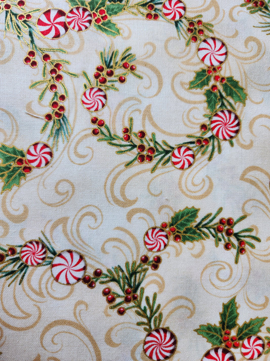 Christmas fabric.  Cream background with peppermint candy twist and holly berries