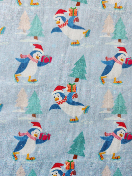Christmas fabric - blue background with cute penguins
