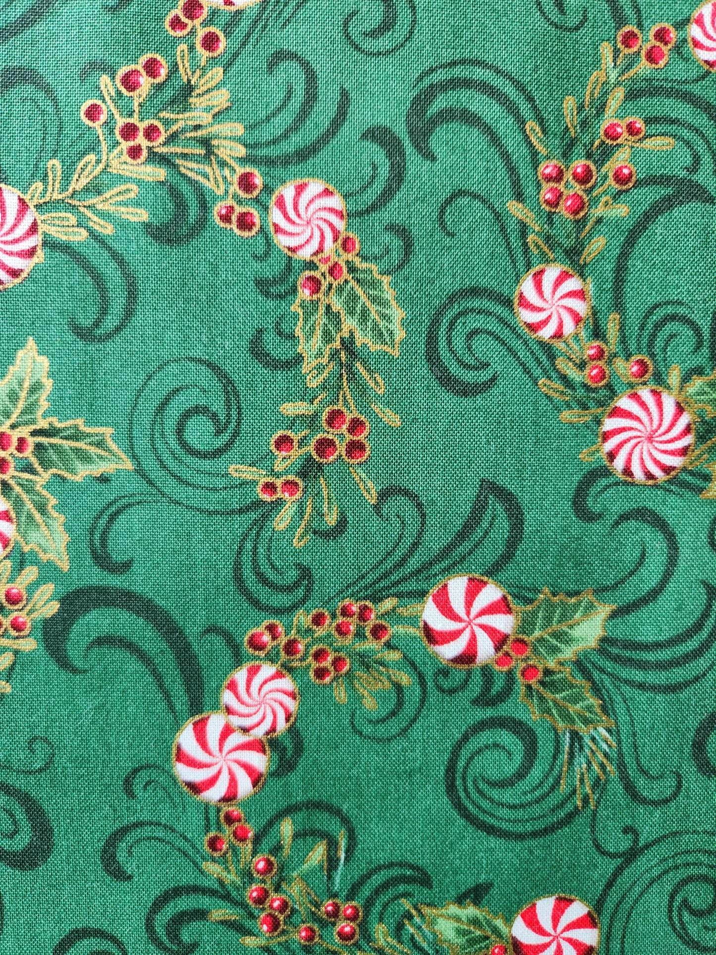 Christmas fabric - green background with red and white accents